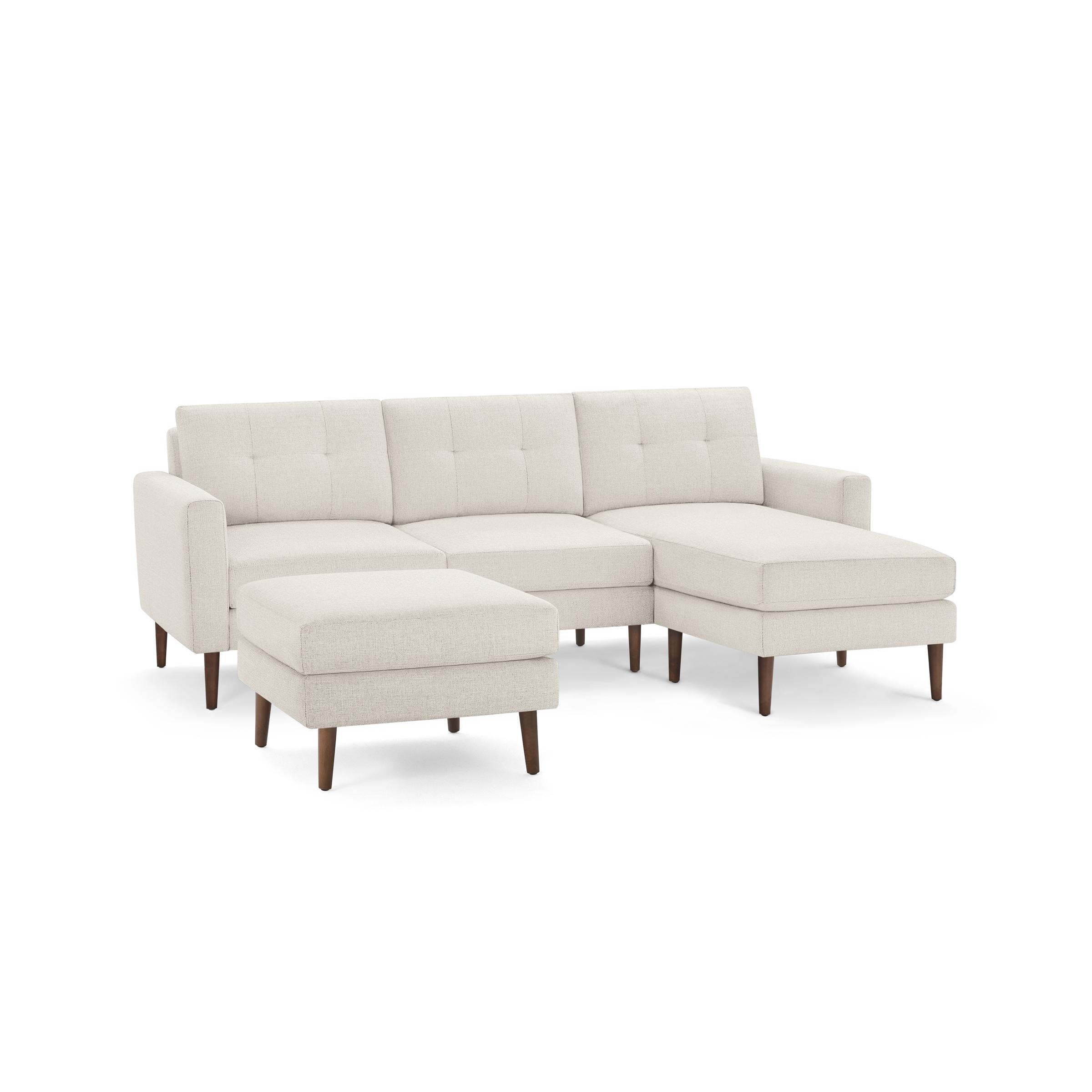 Nomad Sofa Sectional and Ottoman in Ivory, Leg Finish: WalnutLegs - Image 0