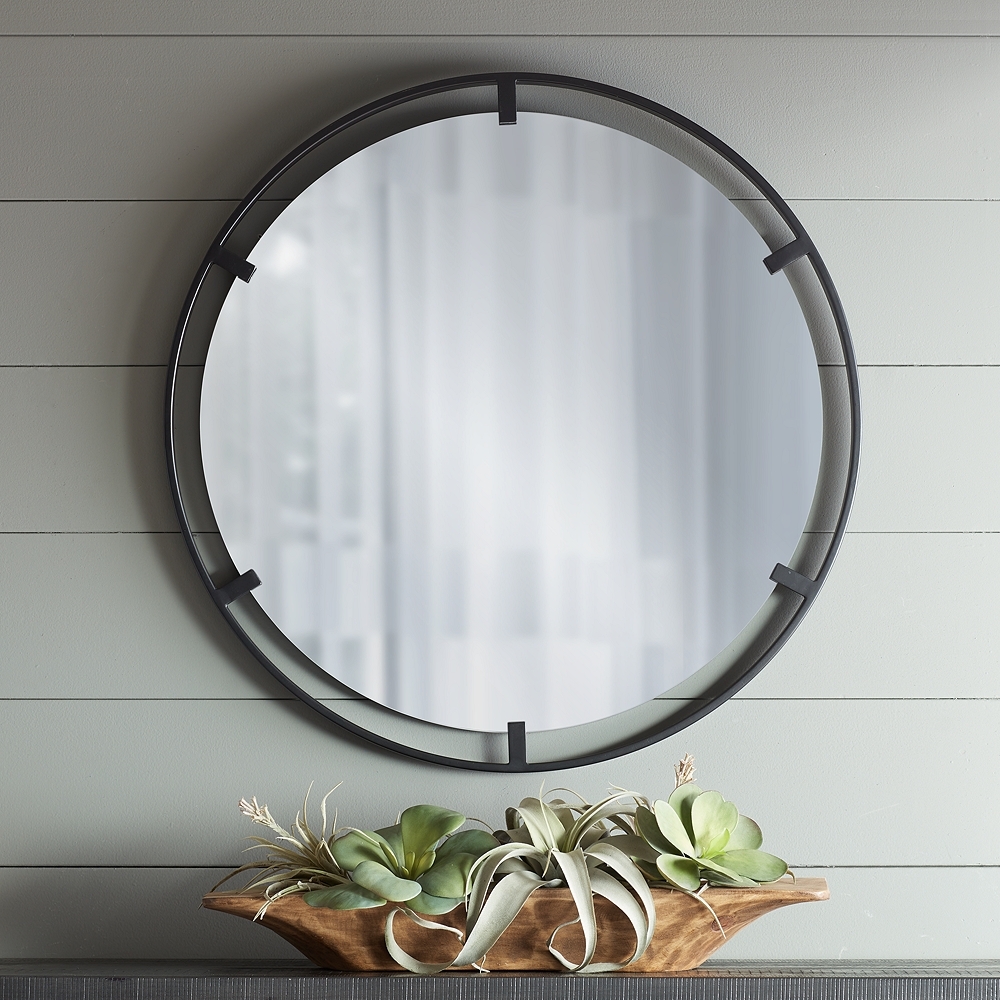 Uttermost Starbird 30" Round Black Openwork Metal Wall Mirror - Image 0