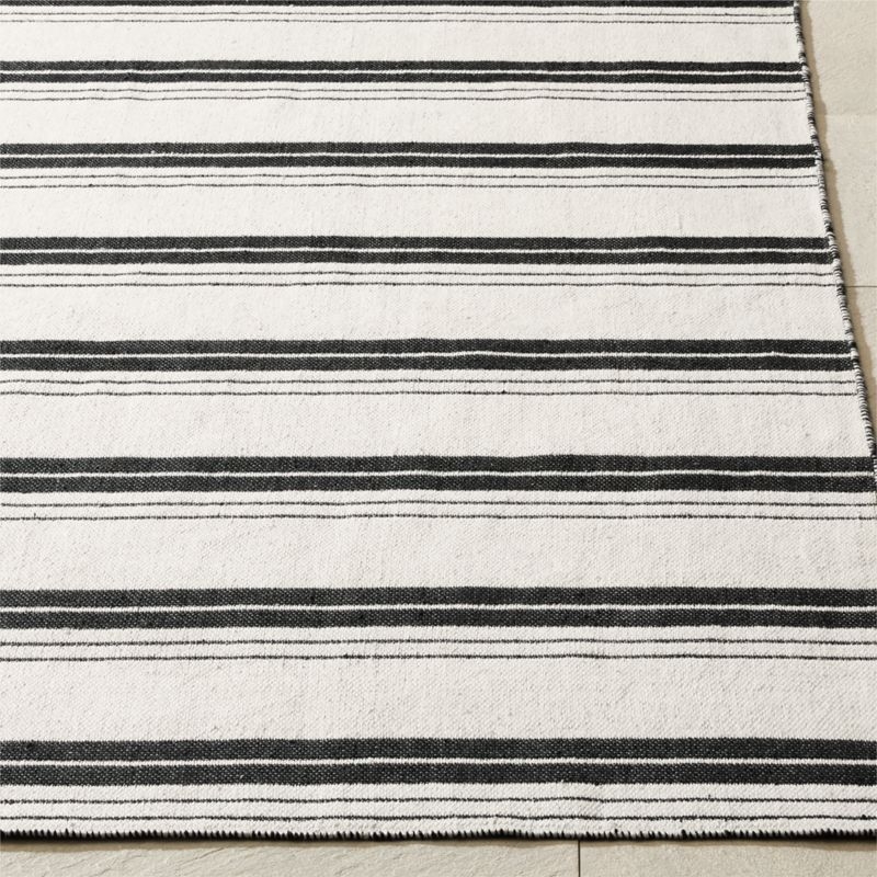 Calyx Black and White Reversible Indoor/Outdoor Performance Area Rug 5'x8' - Image 1