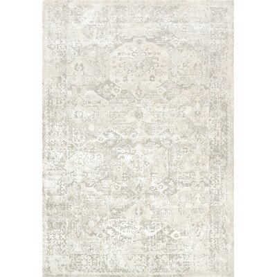 Grisby Ivory Area Rug - Image 0
