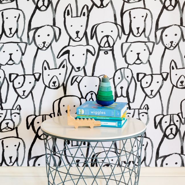 Chasing Paper Black and White Puppy Pile Peel and Stick Wallpaper 2' x 12' - Image 0