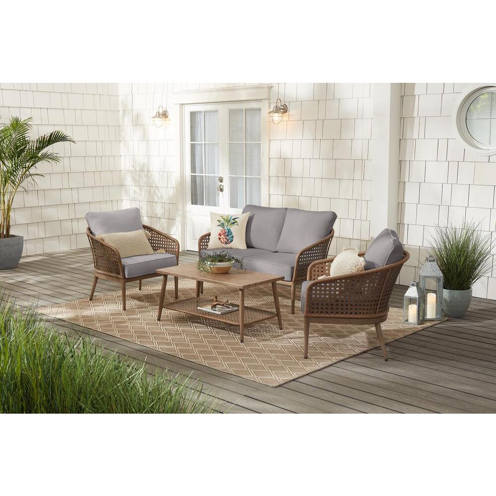 Hampton Bay Coral Vista 4-Piece Brown Wicker and Steel Patio Conversation Seating Set with CushionGuard Stone Gray Cushions - Image 0