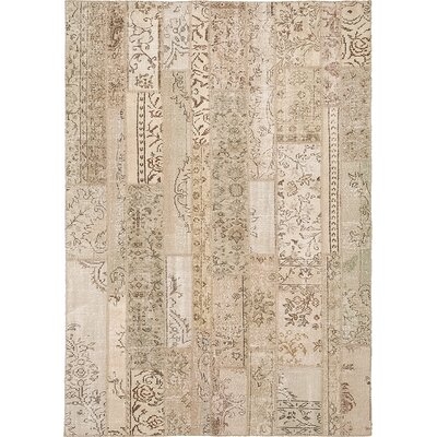 Kye Hand-Knotted Wool/Cotton Sand Dollar Area Rug - Image 0