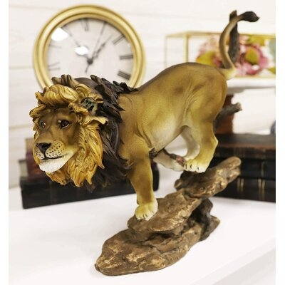 Burgettstown African Lion King of The Jungle Running Down A Sloping Rock Figurine - Image 0