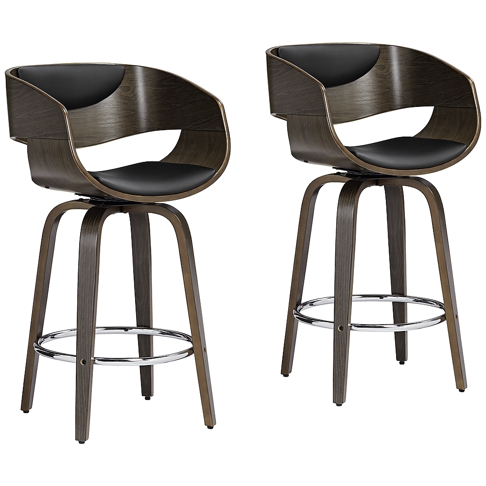 Carson 23 1/2" Black Faux Leather Swivel Counter Stools Set of 2 - Image 0