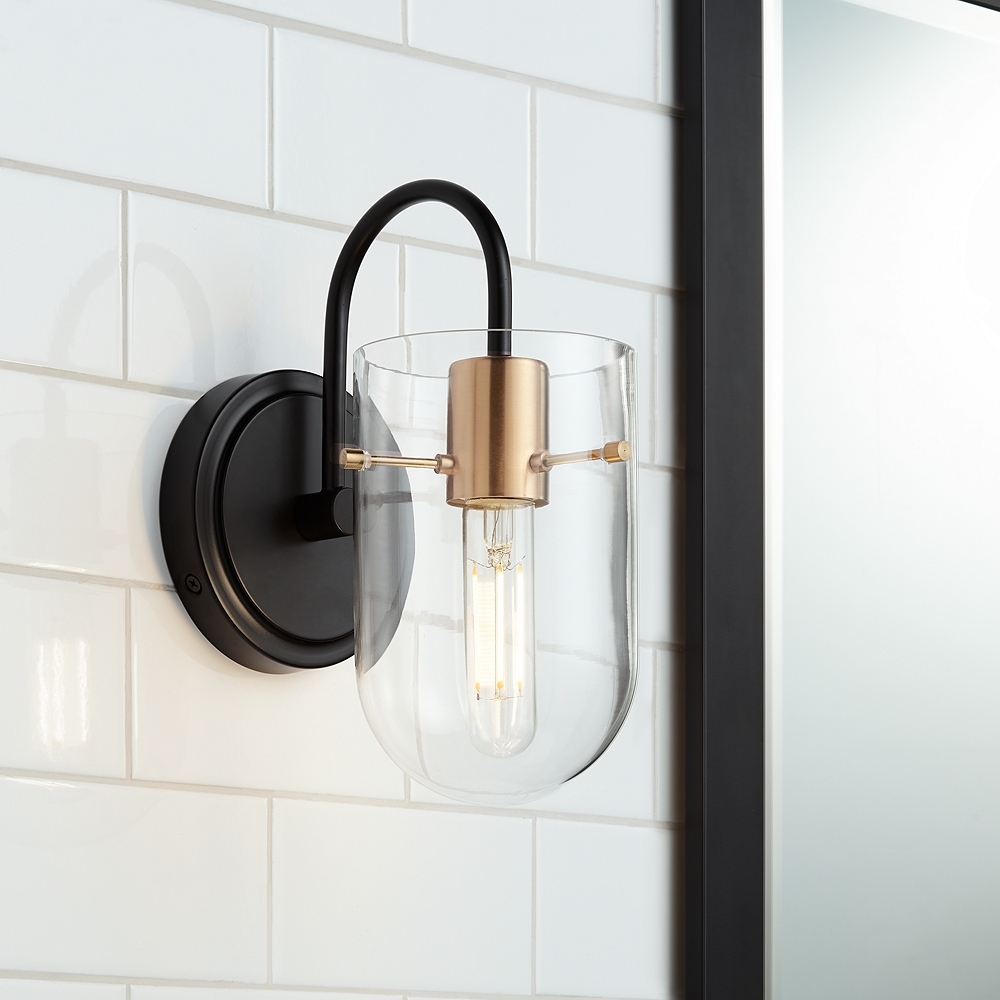 Possini Euro Solomon 9 1/2" High Brass and Black Wall Sconce - Image 0