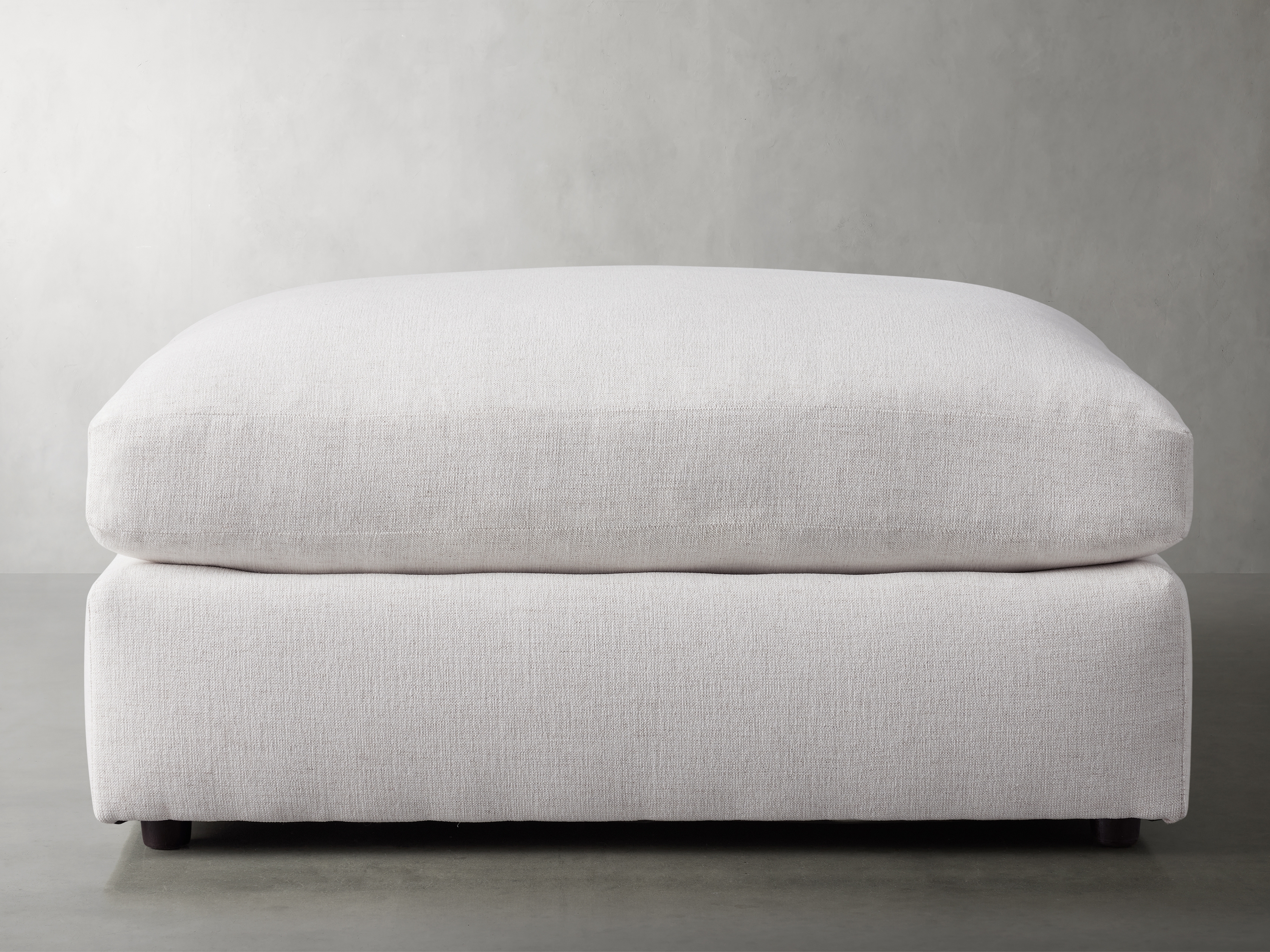 Kipton Ottoman in Upholstered White  Nomad Snow - Image 0