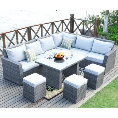 Iverson 8 Piece Rattan Sectional Seating Group with Cushions - Image 0