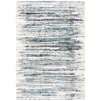 Knuth Abstract Ivory/Teal Area Rug - Image 0