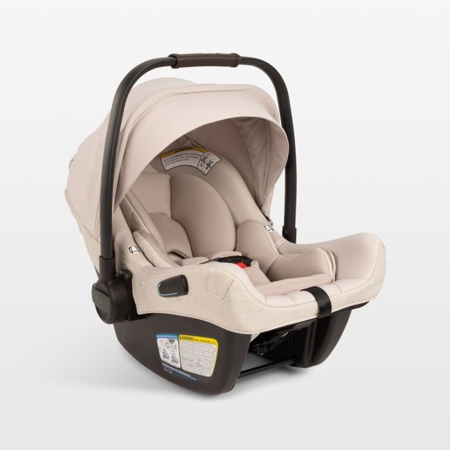 Nuna ® PIPA ™ aire rx Biscotti Brown Reclining Infant Car Seat + PIPA RELX Base - Image 0