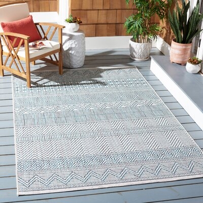 Courtyard Area Rug In Ivory / Turquoise - Image 0