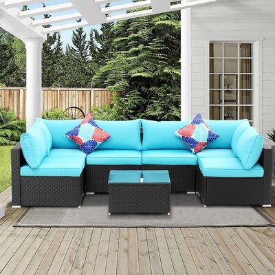 Ingraham 7 Piece Rattan Sectional Seating Group with Cushion - Image 0