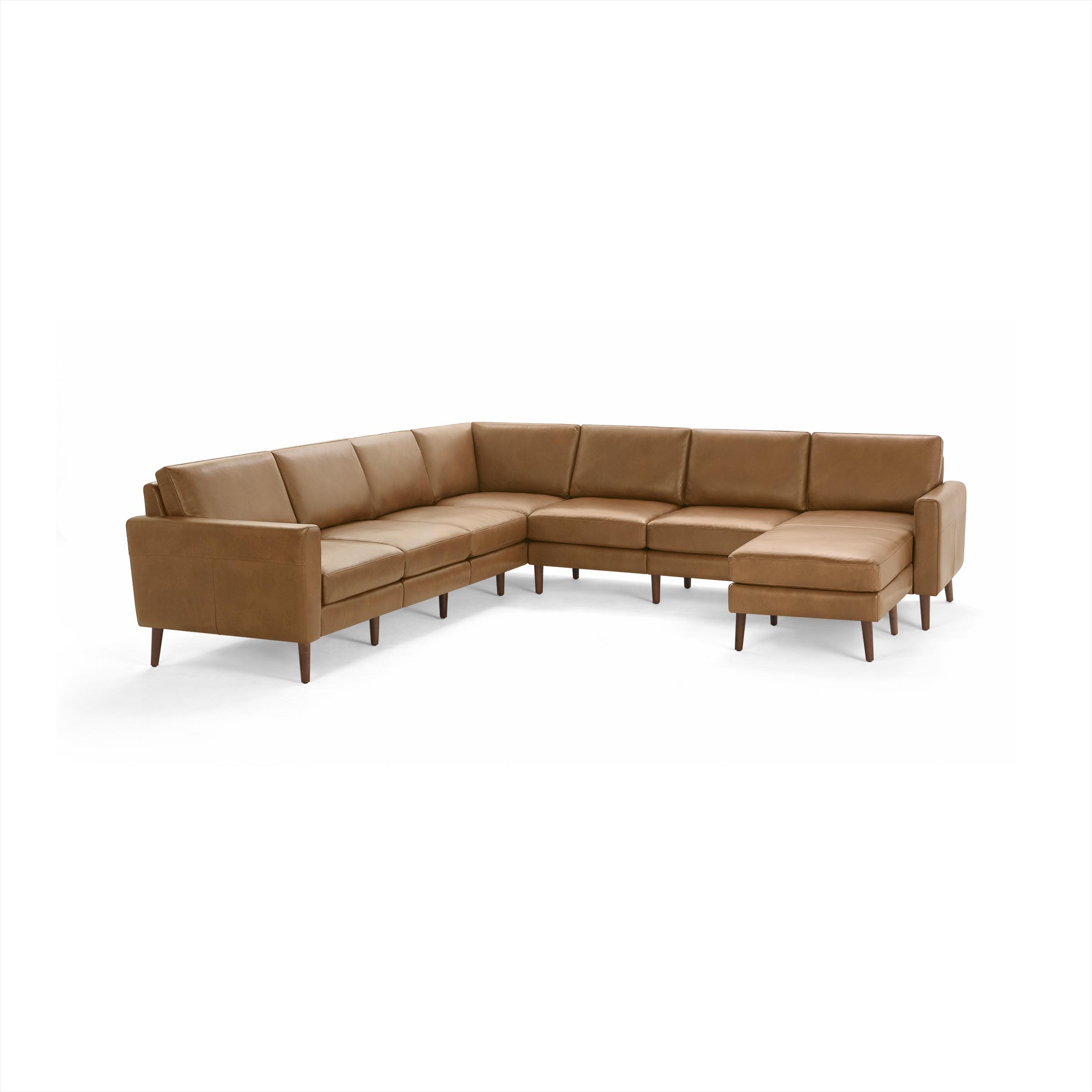 The Nomad Leather 7-Seat Corner Sectional with Chaise in Camel, Walnut Legs - Image 1