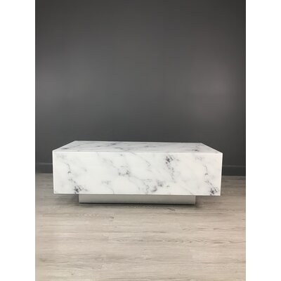 Huitt Solid Coffee Table - Image 0