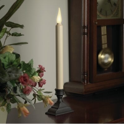 Warm LED Jumping Unscented Flameless Candle - Image 0