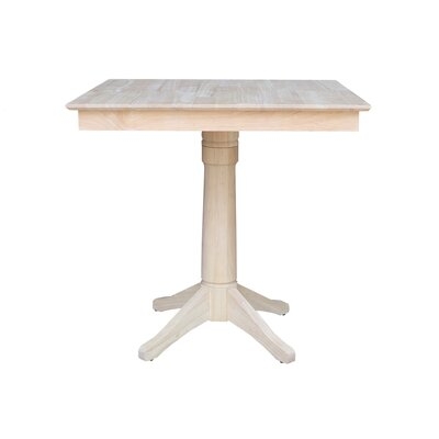Marable Counter Height Rubberwood Solid Wood Pedestal Dining Table - Image 0