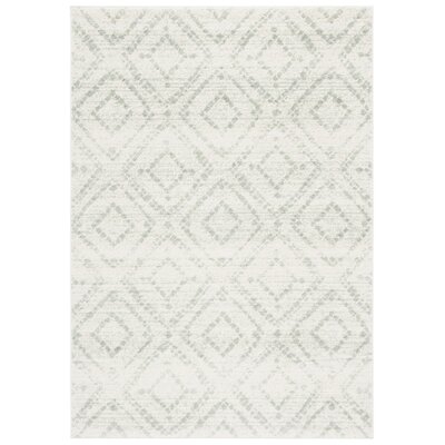 Therese Geometric Ivory/Green Area Rug - Image 1