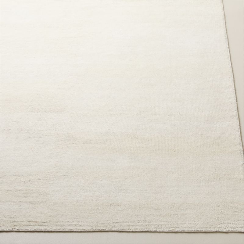 Adao Handwoven Warm White Linen Area Rug 5'x8' - Image 1