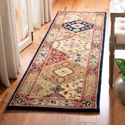 Balthrop Oriental Hand-Tufted Wool Red/Navy Blue/Yellow Area Rug - Image 0