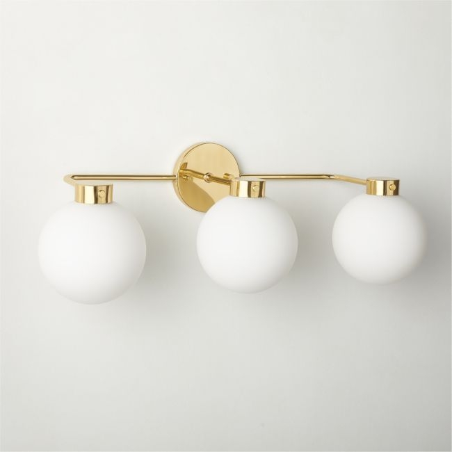 Marra 3-Light Polished Unlacquered Brass Globe Vanity Light - Image 0
