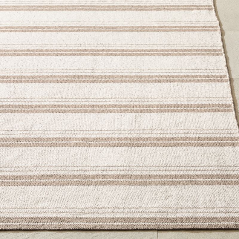 Calyx Sand and White Reversible Indoor/Outdoor Performance Area Rug 5'x8' - Image 1