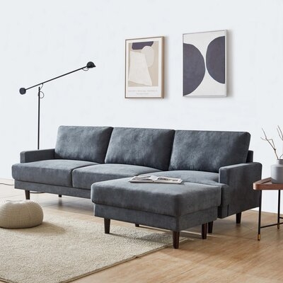 Radstock 104.6'' Wide Reversible Sectional with Ottoman - Image 0