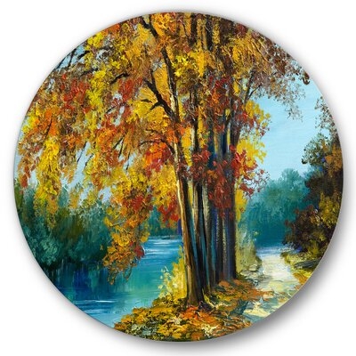 Trees In Warm Autumn Colors By Bright Blue River - Traditional Metal Circle Wall Art - Image 0
