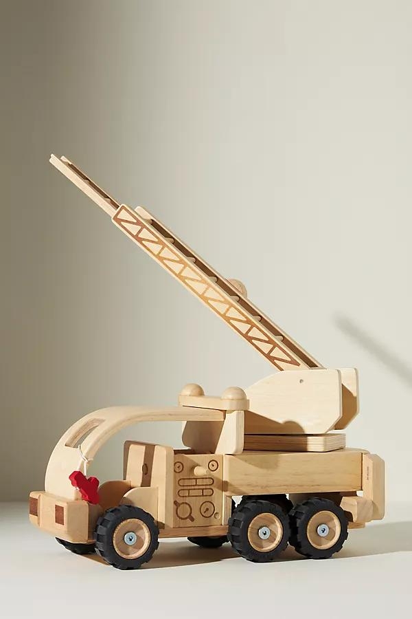 Fire Truck Toy By Plan Toys in Beige - Image 0