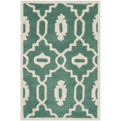 Ilion Moroccan Hand-Tufted Wool Teal/Ivory Area Rug - Image 0