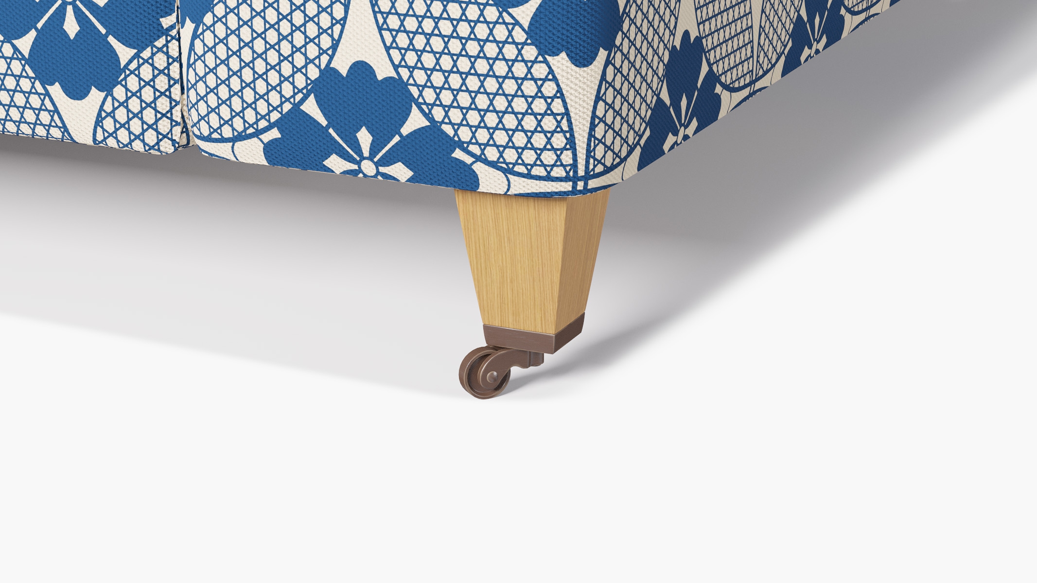 Classic Sofa, Bright Navy Solaire, Natural with Antique Brass Caster - Image 1