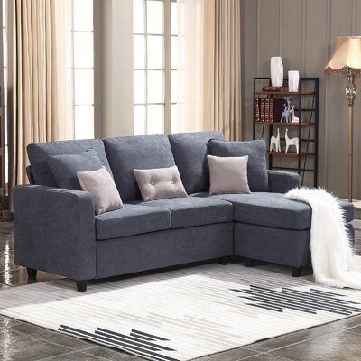 Sylvette 78.5" Reversible Sectional with Ottoman - Image 0