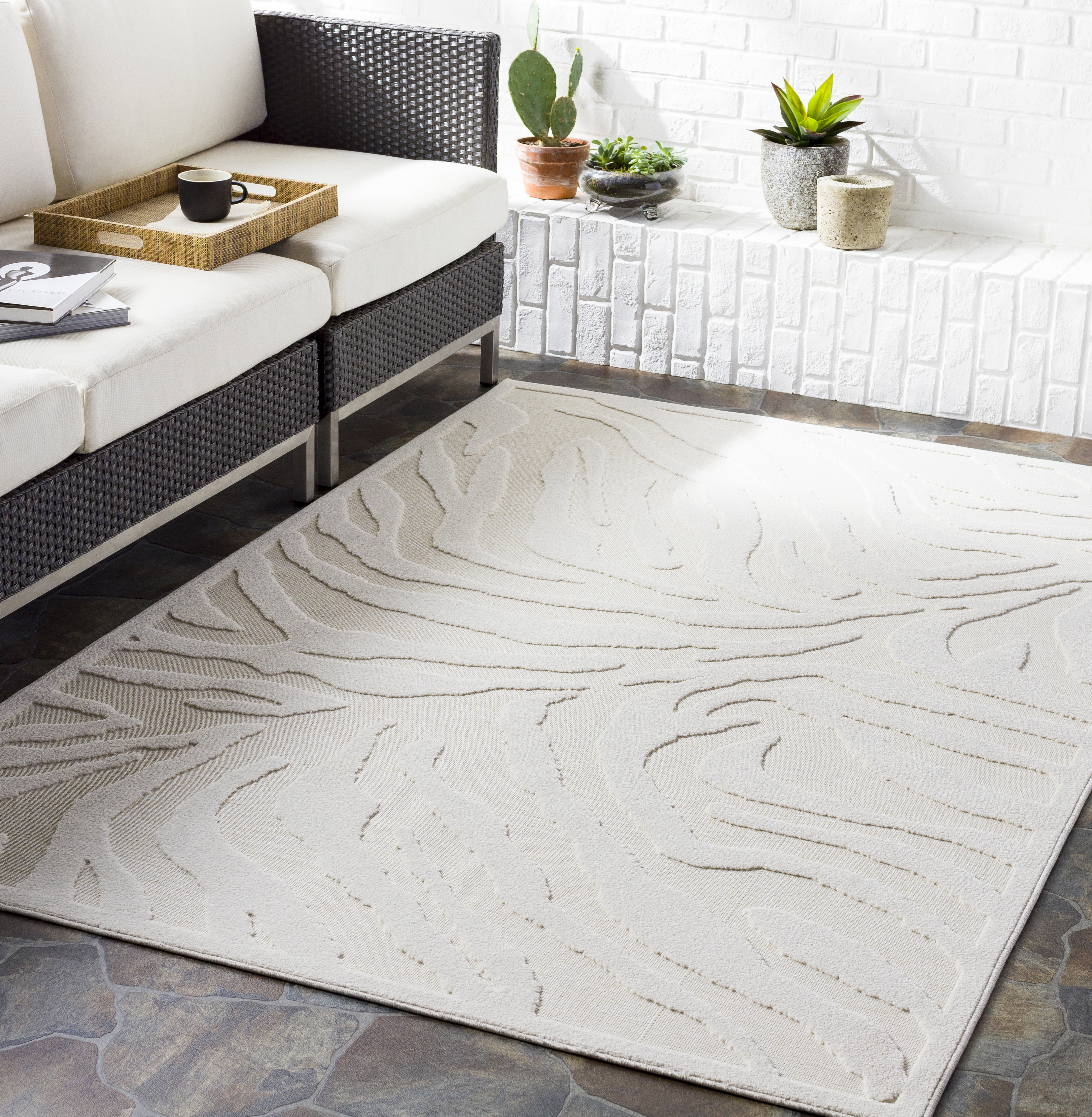 Livabliss Greenwich Beige Outdoor 6'5" x 9' Machine Woven Rug - Image 1