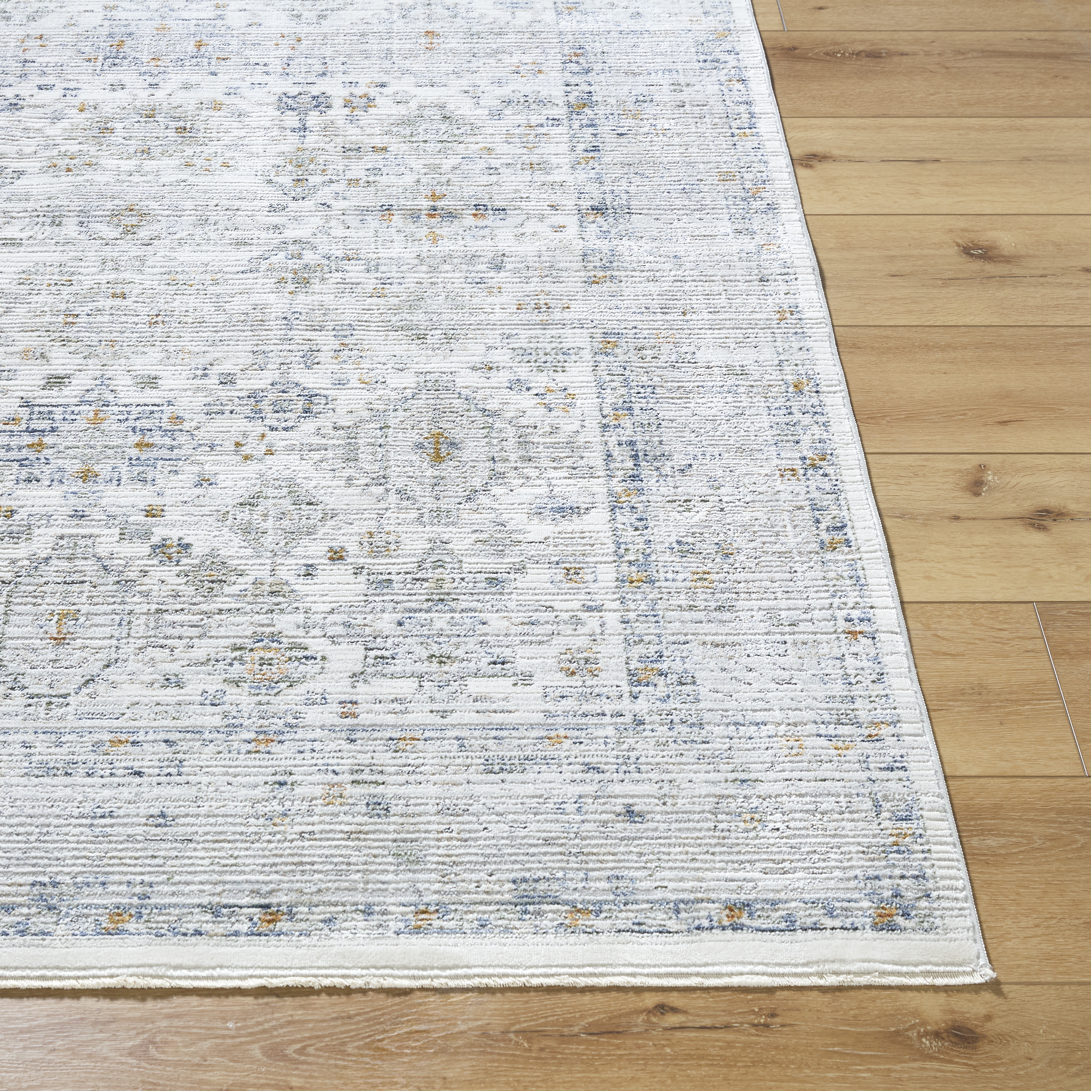 Edmonton White Indoor 6'7" x 9' Machine Woven Rug - Image 1