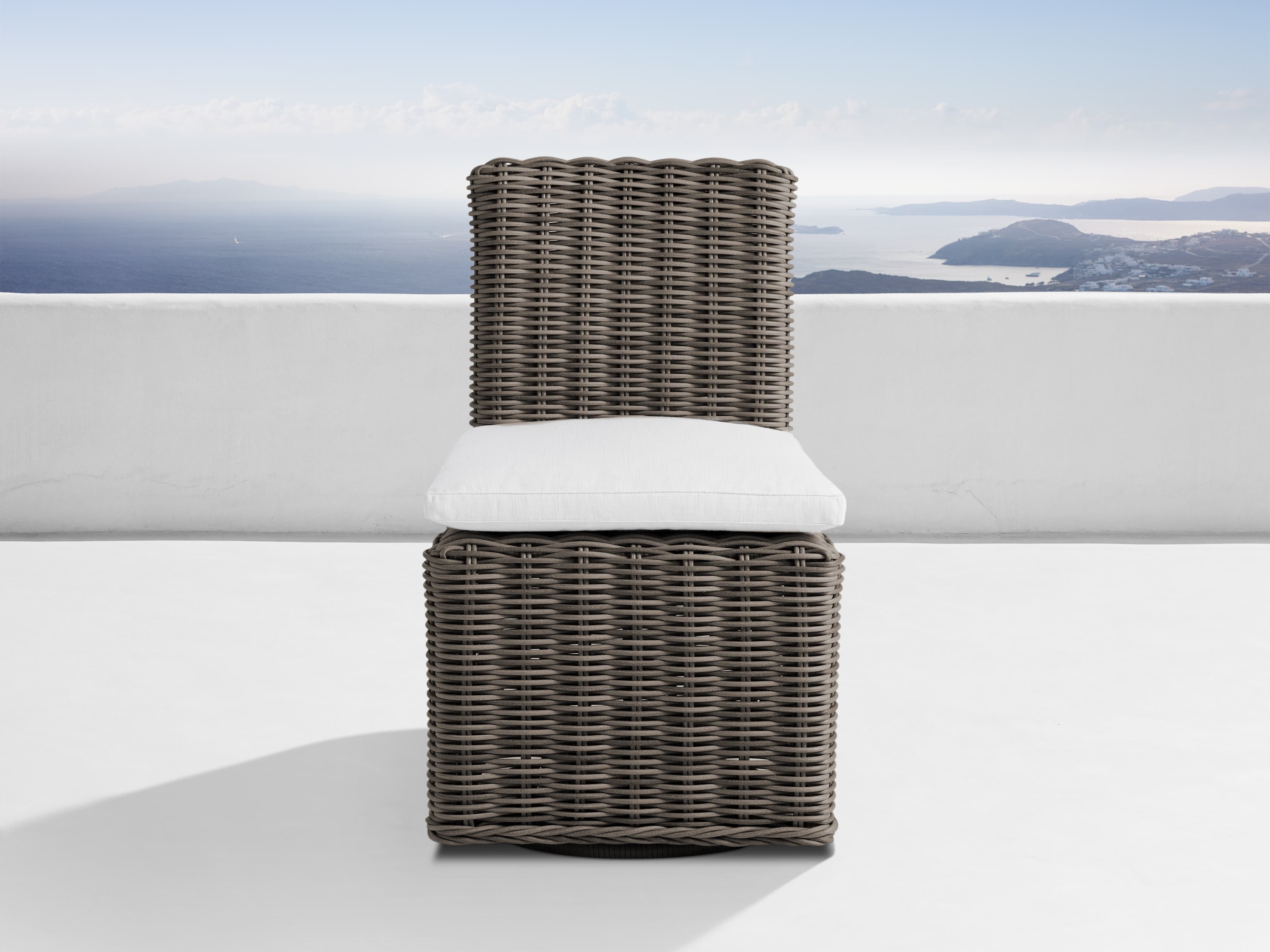 Montauk Outdoor Swivel Dining Side Chair in All Weather Wicker White  Dry Bark/Starboard Snow - Image 0