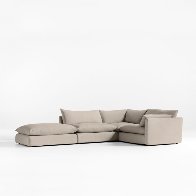 Unwind Modular 4-Piece L-Shaped Slipcovered Sectional Sofa with Ottoman - Image 0