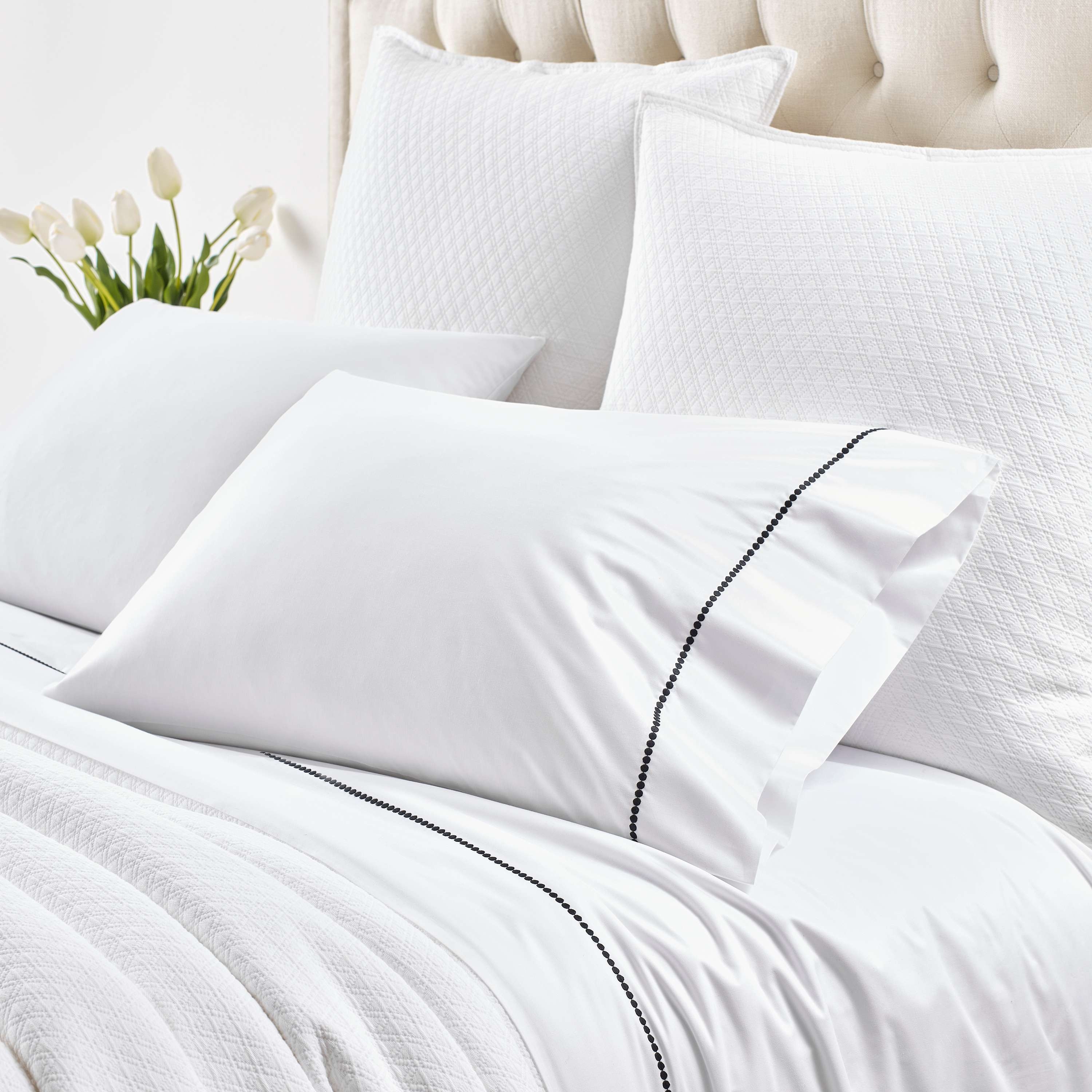Dottie Embroidered Black Pillowcases - Image 0