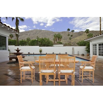 7 Piece Teak Wood Castle Patio Dining Set With Round To Oval Extension Table, 4 Side Chairs And 2 Arm Chairs - Image 0