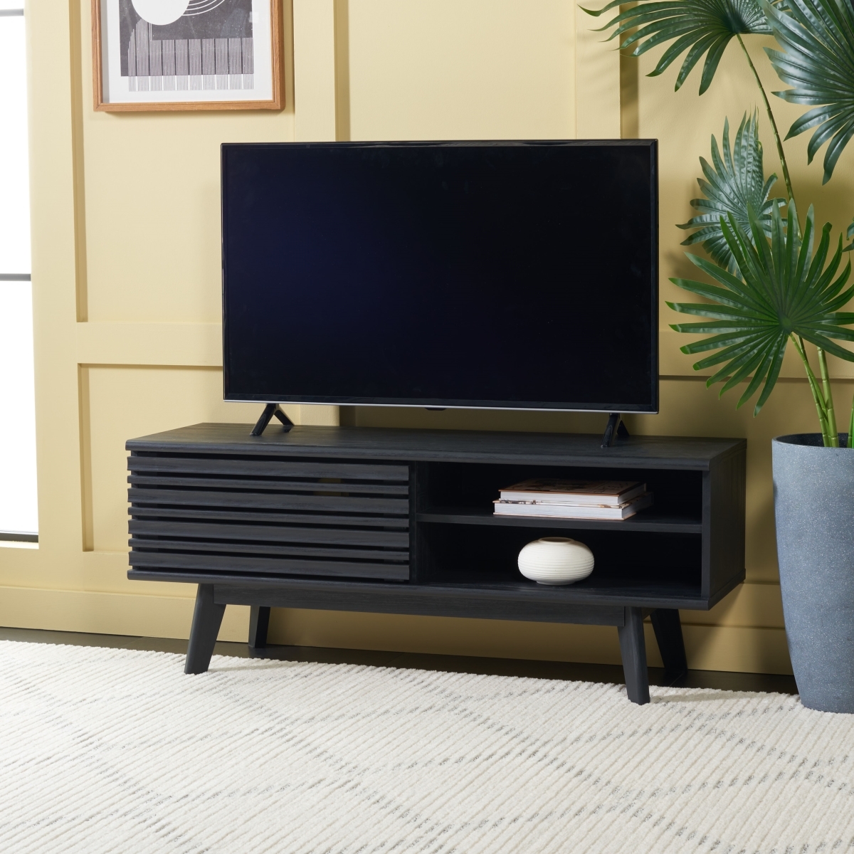 Aurelio 1 Shelf Media Stand - Black - Safavieh - Image 1