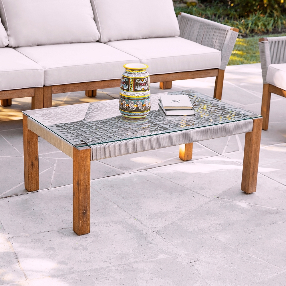 Brendina 39 1/2"W Oiled Acacia Wood Outdoor Cocktail Table - Style # 90X34 - Image 0