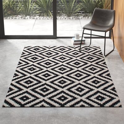 Obadiah Geometric Handmade Tufted Wool Black Area Rug - Image 0