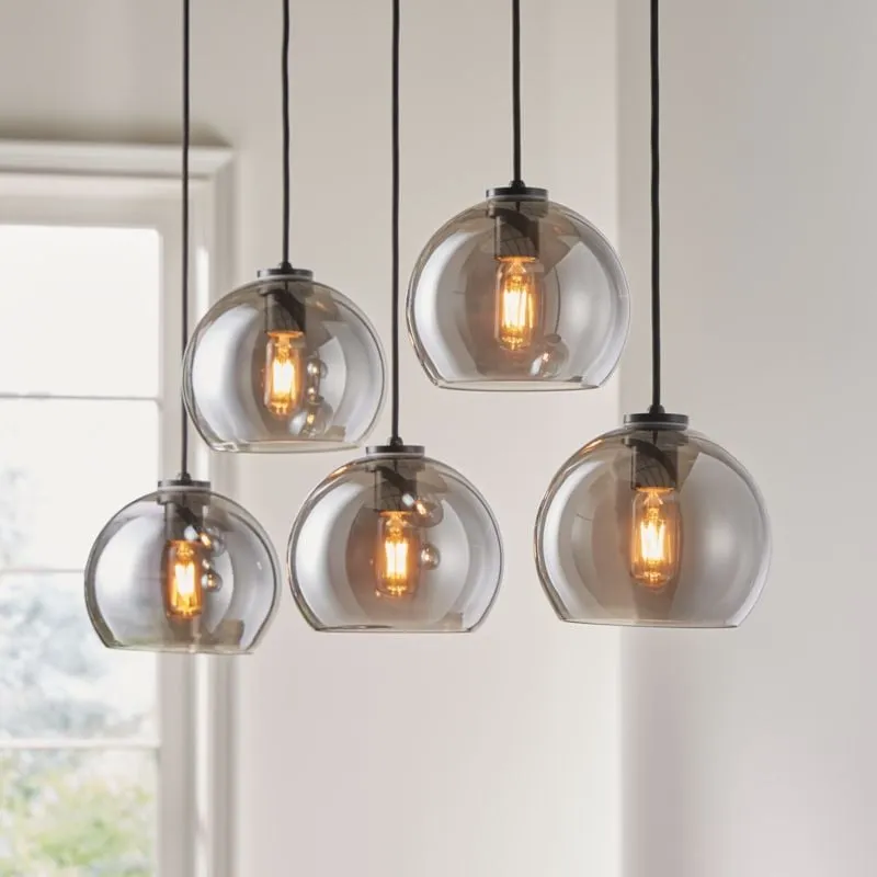 Arren Black 5-Light Linear Pendant with Round Silver Glass Shades 42"