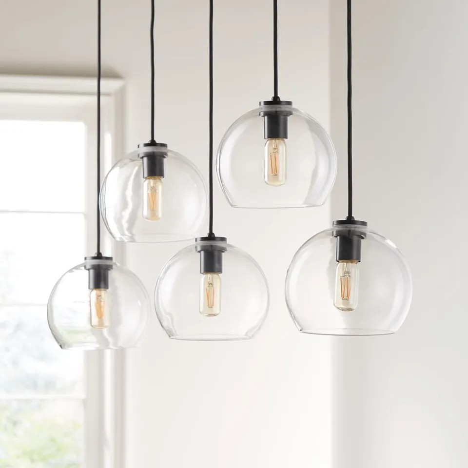 Arren Black 5-Light Linear Pendant with Round Clear Glass Shades 42"