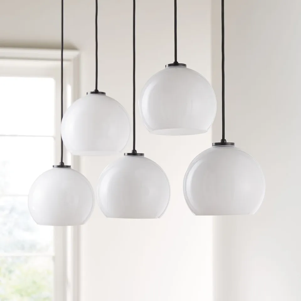 Arren Black 5-Light Linear Pendant with Round Milk Glass Shades 42"