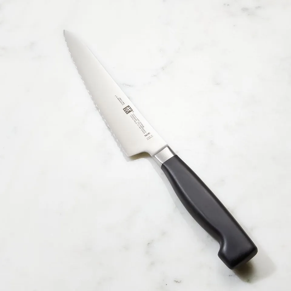 Zwilling ® 5.5" Serrated Prep Knife Four Star