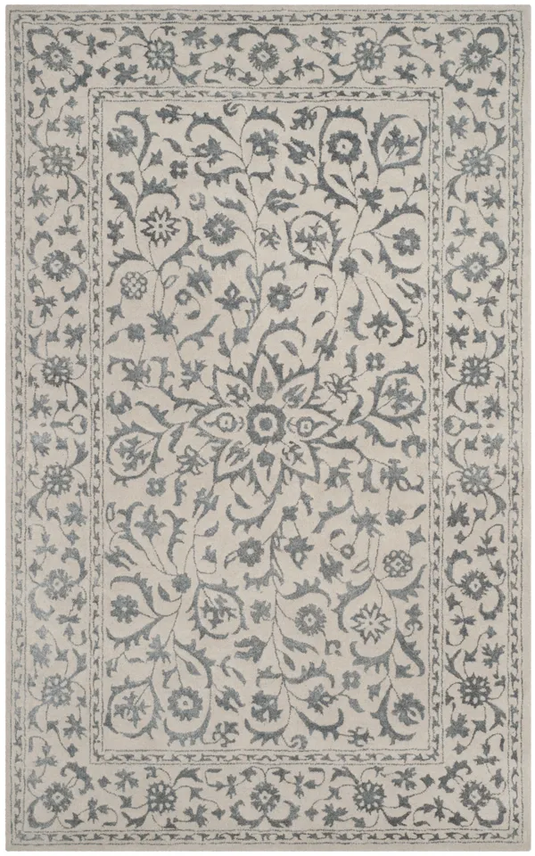 Arlo Home Hand Tufted Area Rug, GLM515A, Silver/Ivory,  6' X 9'