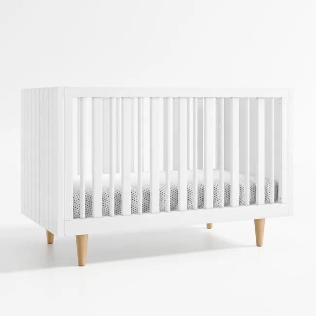 Finn White Wood Convertible Baby Crib with Toddler Bed Rail