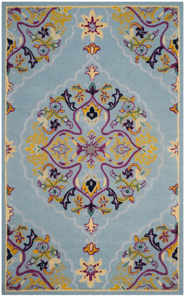 Arlo Home Hand Tufted Area Rug, BLG605B, Light Blue/Multi,  6' X 9'