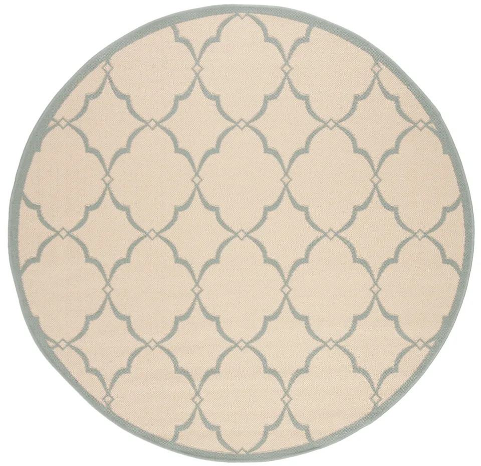 Arlo Home Indoor/Outdoor Woven Area Rug, LND125L, Cream/Aqua,  6' 7" X 6' 7" Round