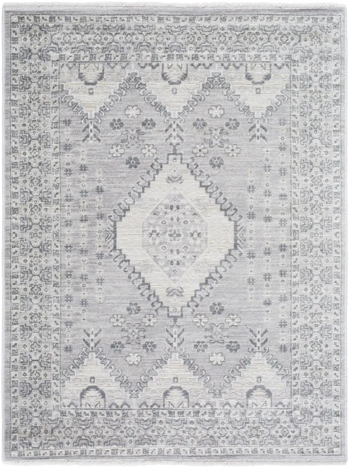 Azhar  Indoor 5'3" x 7' Machine Woven Rug
