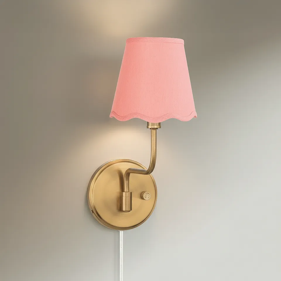 Ophelia 9 1/2"H Warm Brass Plug-In Wall Sconce with Pink Scallop Shade